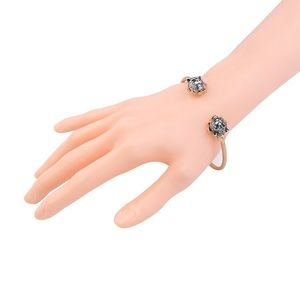 Feline cuff bracelet looks like  Gucci